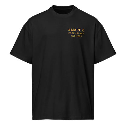 Studio shot of JamRok Essentials Drop 002 Men’s Boxy Tee in premium heavyweight cotton, highlighting the relaxed fit and reinforced ribbed neckline for Caribbean streetwear fashion.